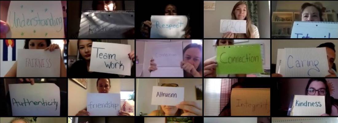 Screenshot of online conference with teachers holding signs
